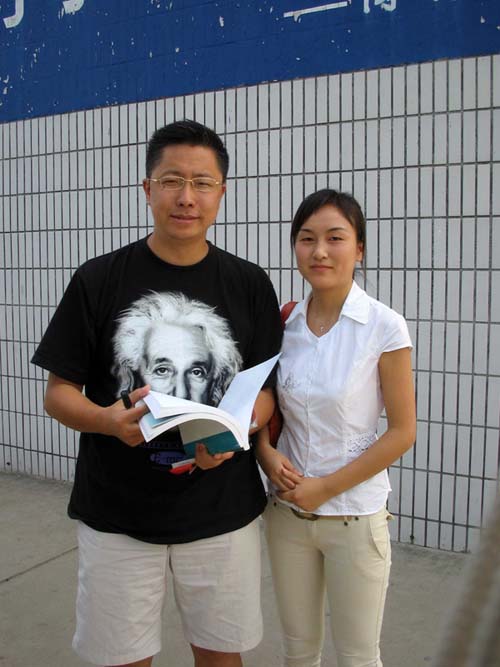李阳和我以前一位朋友的合影